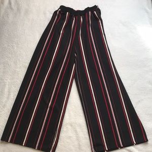 Black, red and white striped professional pants.